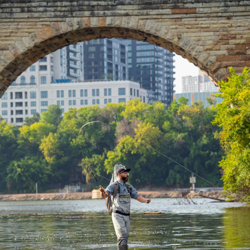 picture of man fishing in orvis ultralight convertible waders