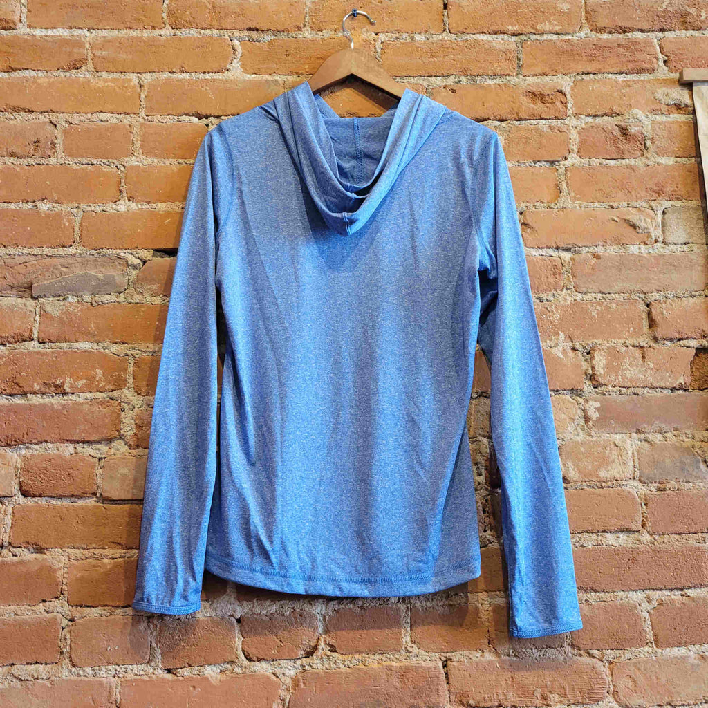 Backside of women's sun hoody, in the colorway Santorini Blue Heather (dark blue). The back features a hood. 