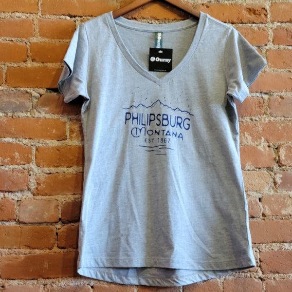 Front of the Ouray women's v neck t-shirt in the colorway Premium Heather (light grey).  The logo "Philipsburg Montana EST. 1867" is printed in white under starry mountains.
